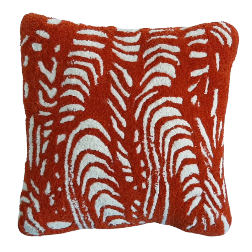 ABSTRACT DESIGN SCATTER CUSION IN BURNT ORANGE