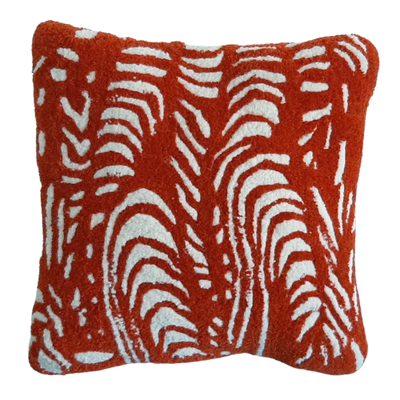 ABSTRACT DESIGN SCATTER CUSION IN BURNT ORANGE